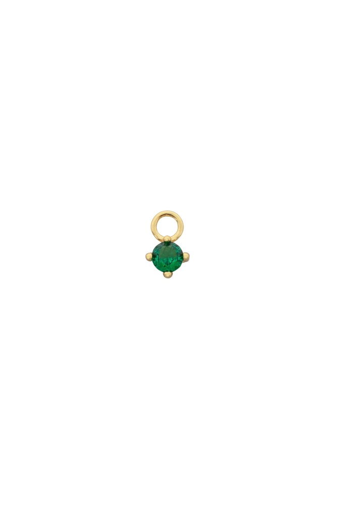 Gold pendant with a green gemstone on a white background