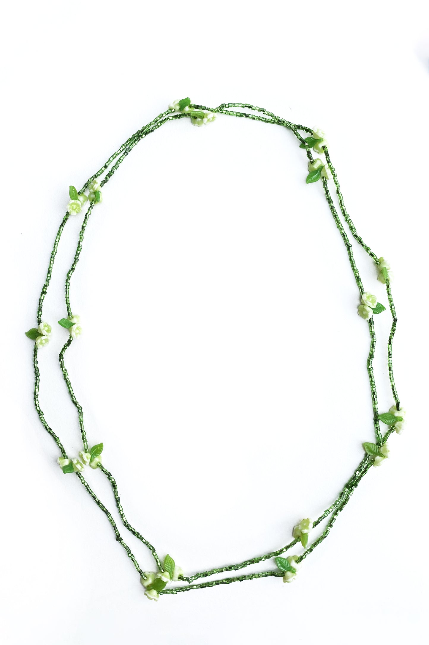 petite green seed bead and flower long necklace