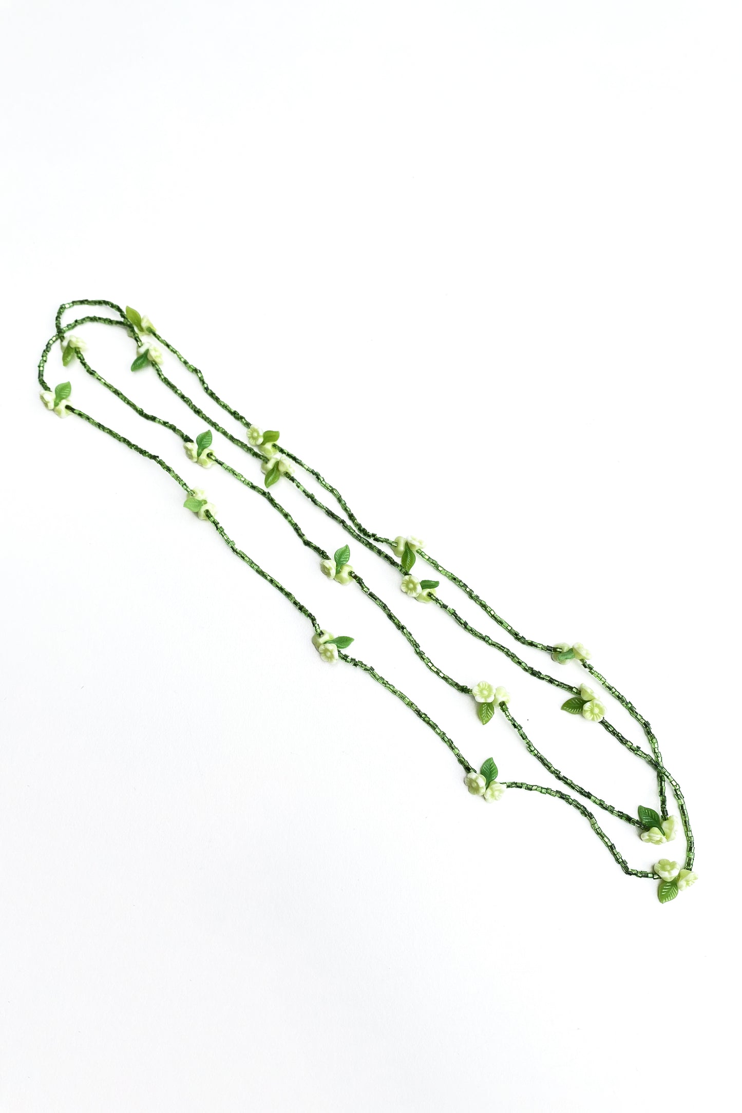 petite green seed bead and flower long necklace